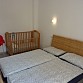 1. Schlafzimmer mit Doppelbett, Schrank, Gitterbett und Hochstuhl kostenlos