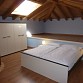 Schlafzimmer im 1 Stock mit Doppelbett und grossem Schrank 