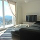 Wohnzimmer mit Schlafsofa f 2 Personen, 50 Zoll TV und Panoramablick